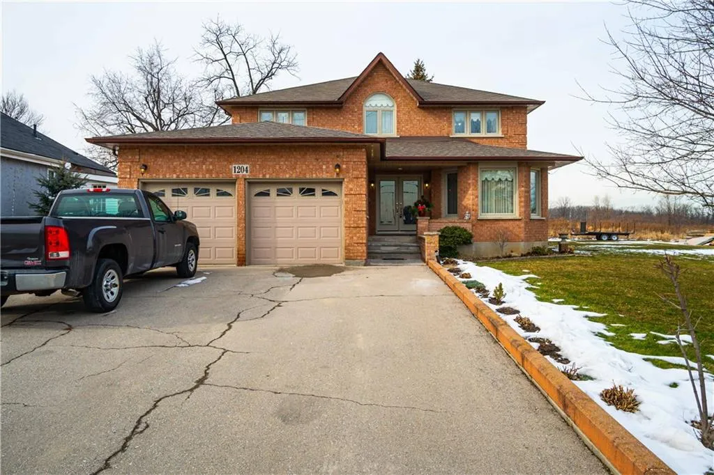 West 5th Whole-Home Renovation, Hamilton Mountain — before: Front Exterior