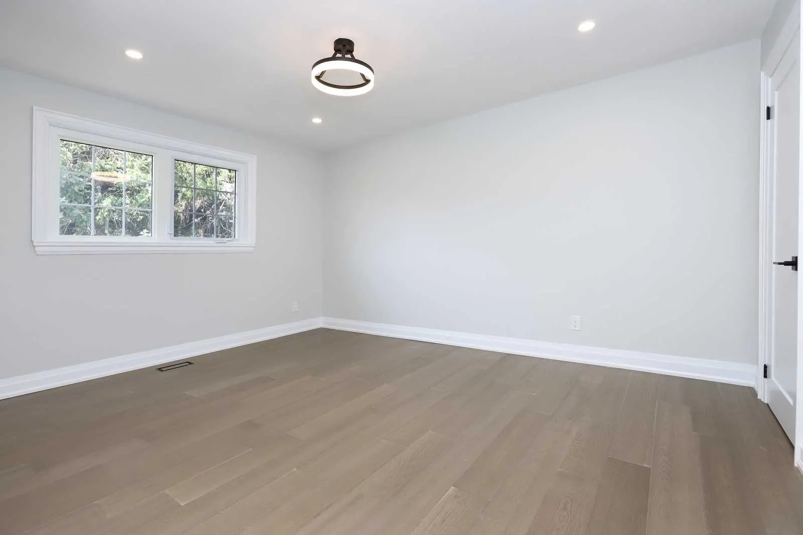 Bramalea Woods Whole-Home Renovation, Brampton, ON — after: Bedroom 2